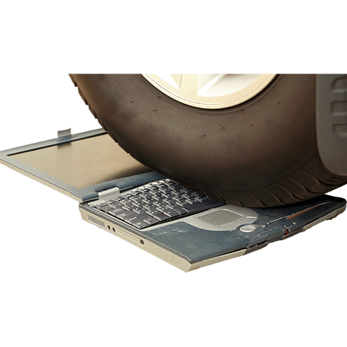 Laptop computer being run over by car